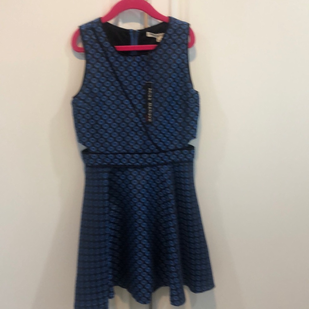 Miss behave girls dress. Cut out sides